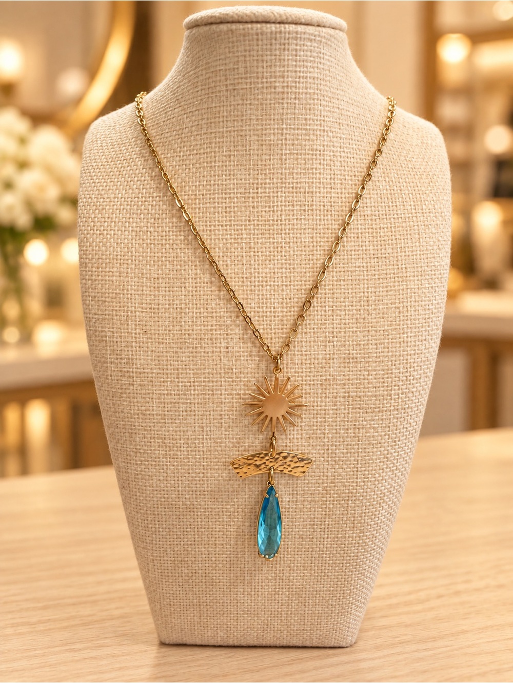 Gold aqua burst necklace